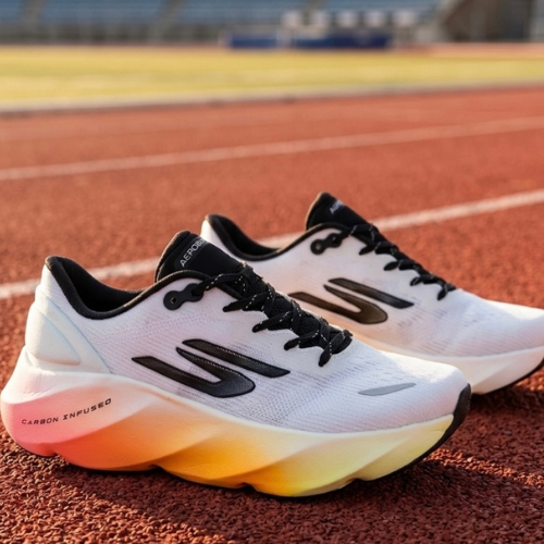 Pink running shoe on a white background