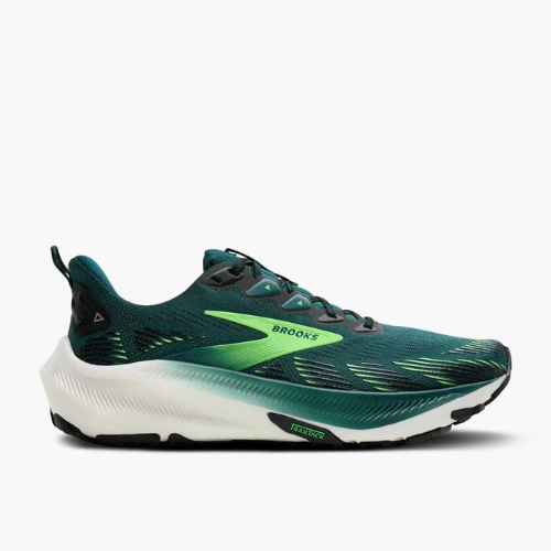 Green and black running shoe with 'Brooks' branding on a white background