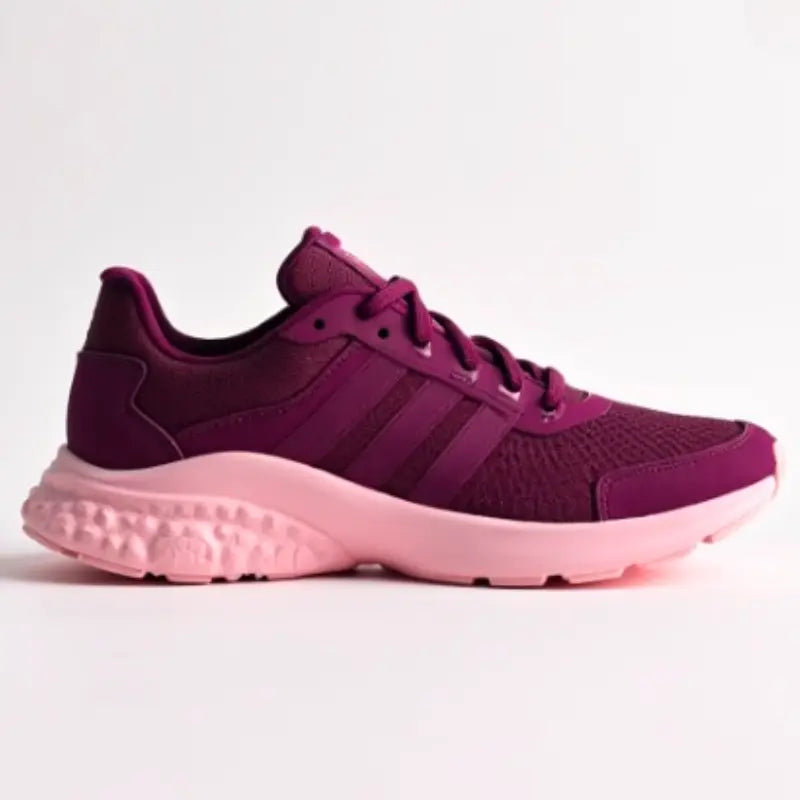 Purple and pink Adidas sneaker on a light gray background